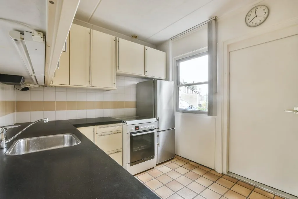 Large cozy kitchen with tiled floors